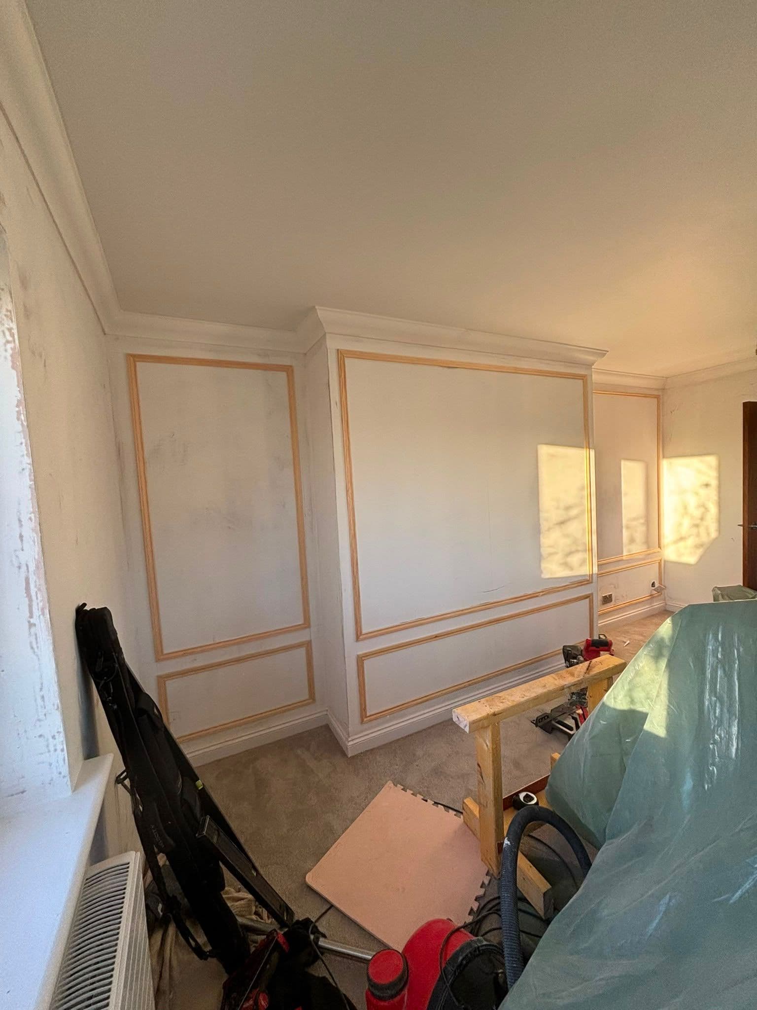 Feature wall panelling installed in a bedroom